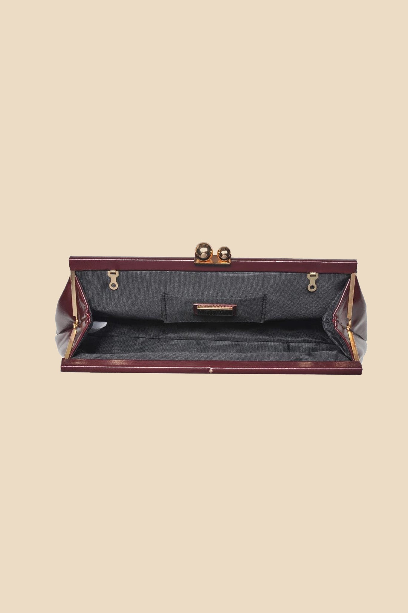 Joplin Kisslock Patent Faux Leather Clutch (Three Colors)