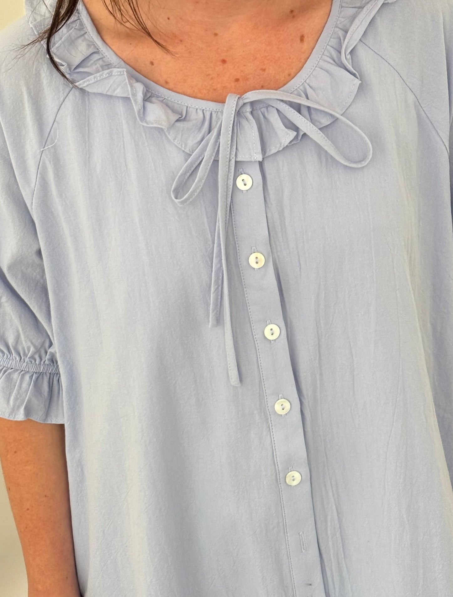 Things Between Dorothy Baby Blue Ruffle Button Mini Dress