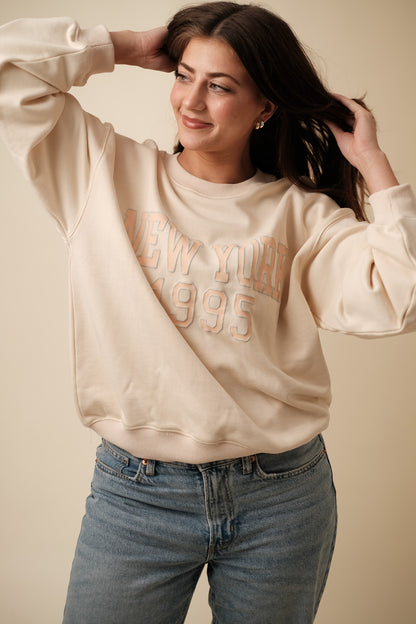 Miou Muse Kennedy Oversized Graphic Sweatshirt (Cream)