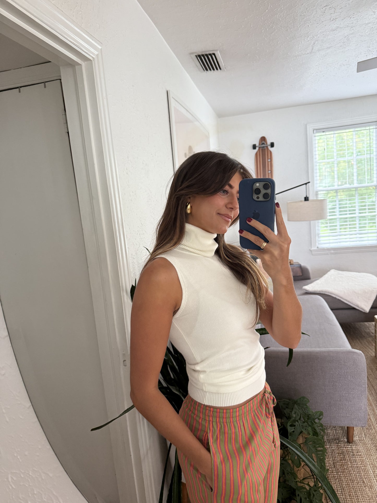 Molly Bracken Pearl Cream Sleeveless Turtleneck Knit Top (L)