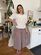 Things Between Dori Brown Pinstripe Pleated Midi Skirt