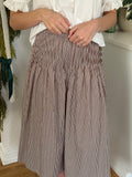 Things Between Dori Brown Pinstripe Pleated Midi Skirt