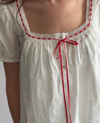 Things Between Josie White Ribbon Tie Cotton Babydoll Top