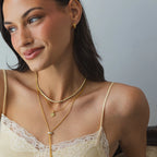 Brenda Grands 18K Gold Baguette Huggie Earrings